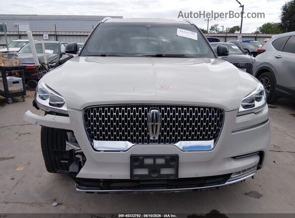 5LM5J7WC0PGL00712 2023 LINCOLN AVIATOR Beige Սալոնի հետևի տեսք