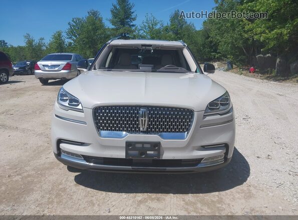 5LM5J7XC4MGL09858 2021 LINCOLN AVIATOR Кремовый Вид задней части салона