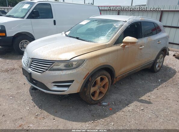 5LMCJ1C90GUJ28812 2016 LINCOLN MKC Silver Vista tres cuartos delantera izquierda