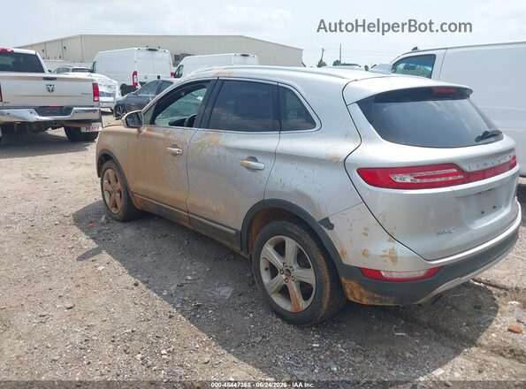 5LMCJ1C90GUJ28812 2016 LINCOLN MKC Silver Trasero izquierdo