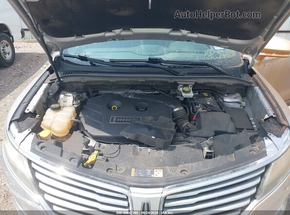 5LMCJ1C90GUJ28812 2016 LINCOLN MKC Silver Vista trasera
