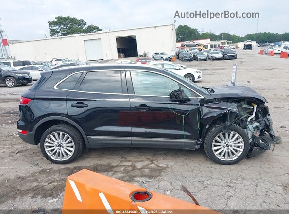 5LMCJ1C90KUL43602 2019 LINCOLN MKC Black Widok wnętrza z tyłu