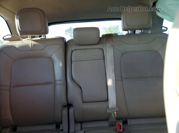 5LMCJ1C94LUL16209 2020 LINCOLN CORSAIR Tan Vista de los asientos traseros