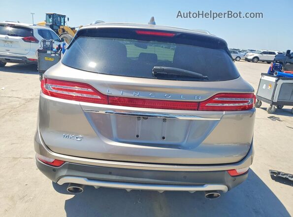 5LMCJ1C99KUL39029 2019 LINCOLN MKC Tan უკანა ხედი