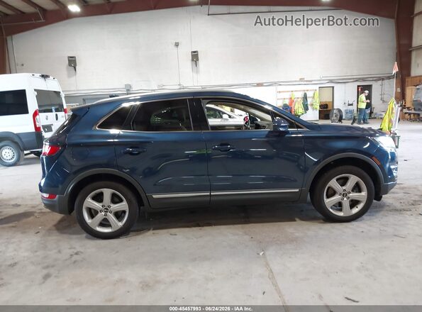 5LMCJ1D90HUL27360 2017 LINCOLN MKC Blue Սալոնի հետևի տեսք