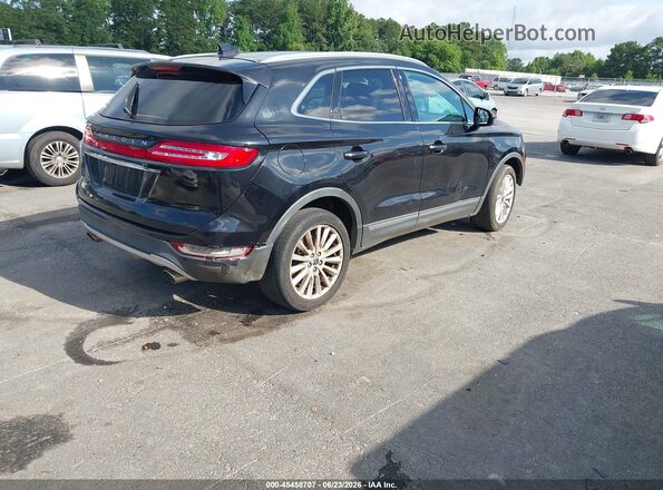 5LMCJ1D98KUL07008 2019 LINCOLN MKC Black Tył prawy