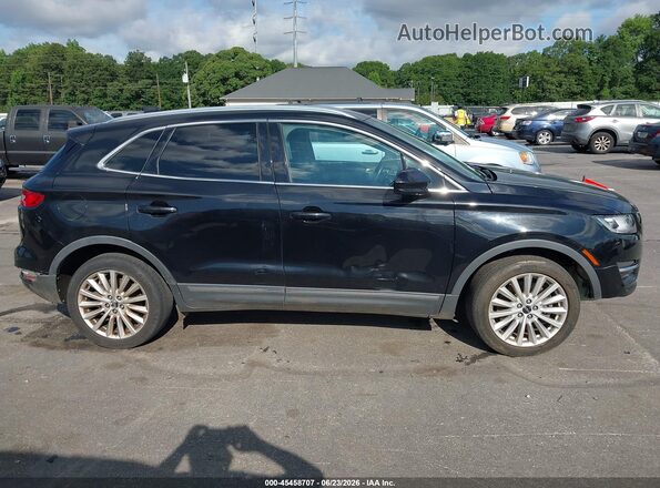 5LMCJ1D98KUL07008 2019 LINCOLN MKC Black Widok wnętrza z tyłu
