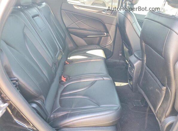 5LMCJ1D98KUL42535 2019 LINCOLN MKC Black Vista interior trasera