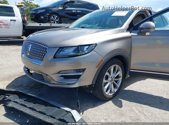 5LMCJ2C90KUL50183 2019 LINCOLN MKC Beige Vista frontal