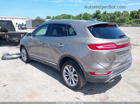 5LMCJ2C90KUL50183 2019 LINCOLN MKC Beige Trasero izquierdo