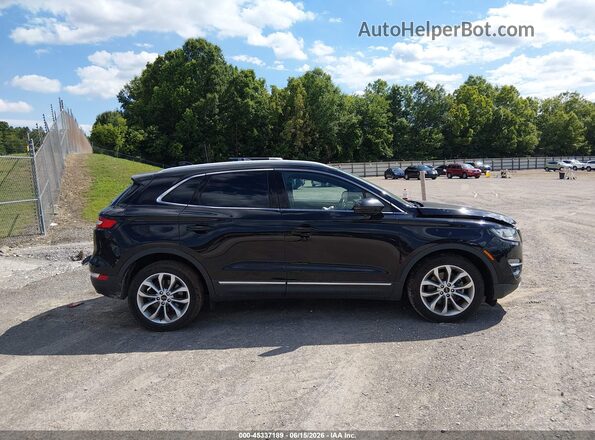 5LMCJ2C92KUL37581 2019 LINCOLN MKC Black Rear interior view