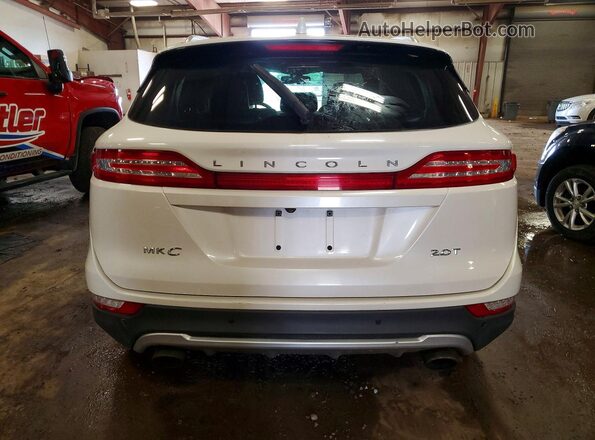 5LMCJ2C95HUL69062 2017 LINCOLN MKC Cream Вид ззаду