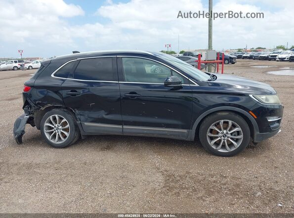 5LMCJ2C96GUJ20610 2016 LINCOLN MKC Black Սալոնի հետևի տեսք