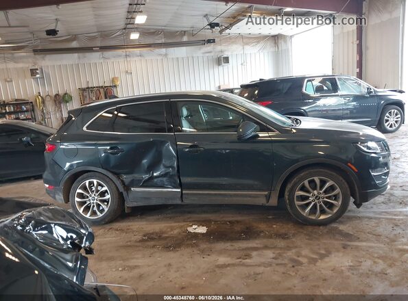 5LMCJ2C97KUL20663 2019 LINCOLN MKC Blue Vista interior trasera