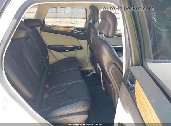 5LMCJ2C99GUJ05308 2016 LINCOLN MKC White Widok naklejki z numerem VIN