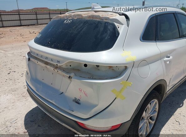 5LMCJ2C99GUJ05308 2016 LINCOLN MKC White Widok wnętrza z tyłu