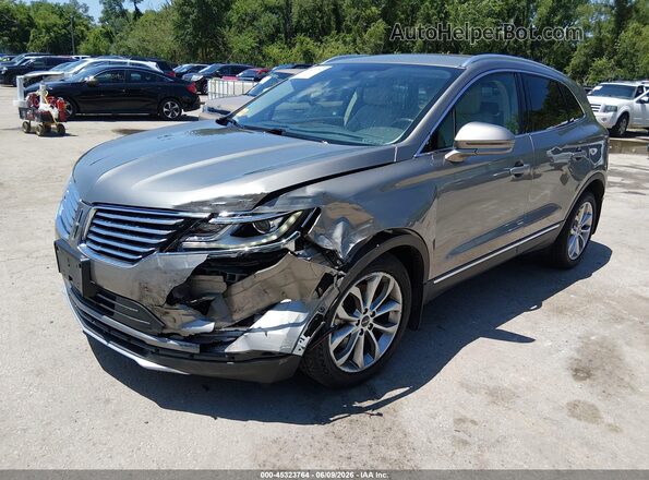 5LMCJ2C99HUL22584 2017 LINCOLN MKC Gray Առջևի ձախ երեք քառորդ տեսարան