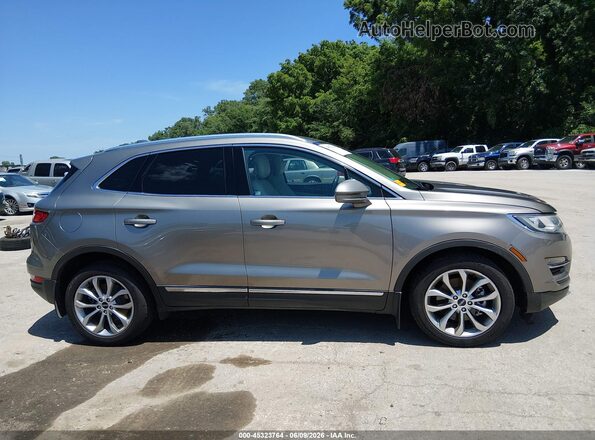 5LMCJ2C99HUL22584 2017 LINCOLN MKC Gray Սալոնի հետևի տեսք