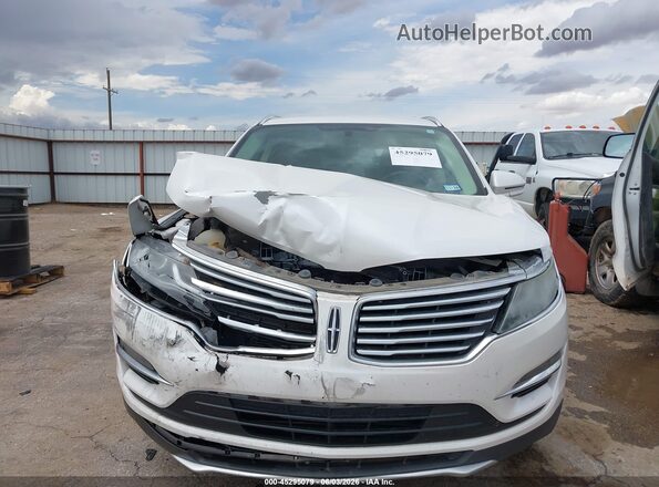 5LMCJ2C99JUL20405 2018 LINCOLN MKC White Սարքավորումների վահանակի տեսք