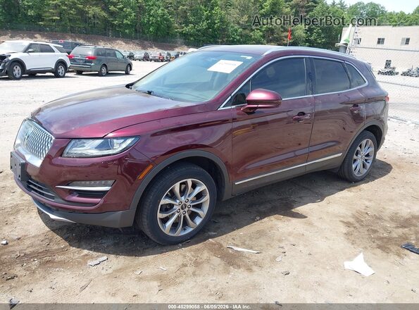 5LMCJ2D90KUL09695 2019 LINCOLN MKC Burgundy Vista tres cuartos delantera izquierda