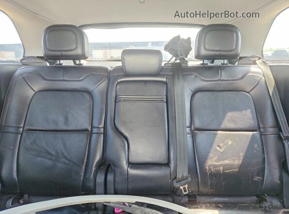 5LMCJ2D92MUL05800 2021 LINCOLN CORSAIR White Vista de los asientos traseros
