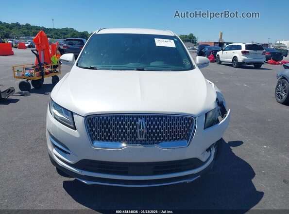 5LMCJ2D94KUL44403 2019 LINCOLN MKC White Widok wnętrza z tyłu