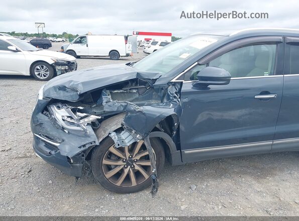 5LMCJ3C94KUL04135 2019 LINCOLN MKC Blue Front view