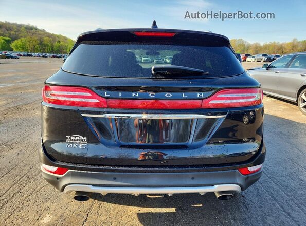 5LMCJ3D94KUL43421 2019 LINCOLN MKC Black Rear view