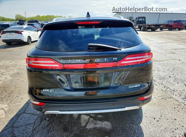5LMCJ3D96GUJ30008 2016 LINCOLN MKC Black Rear view