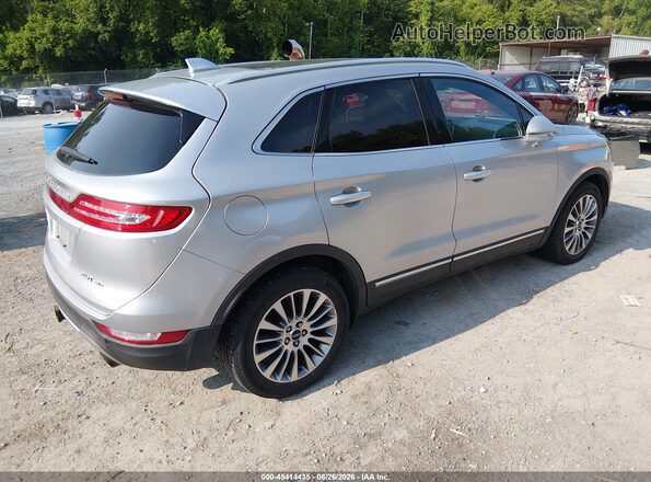 5LMCJ3D99HUL04977 2017 LINCOLN MKC Silver Tył prawy