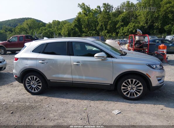 5LMCJ3D99HUL04977 2017 LINCOLN MKC Silver Widok wnętrza z tyłu