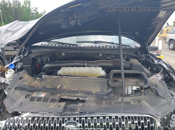 5LMJJ2LG9REL19153 2024 LINCOLN NAVIGATOR Black Вид ззаду