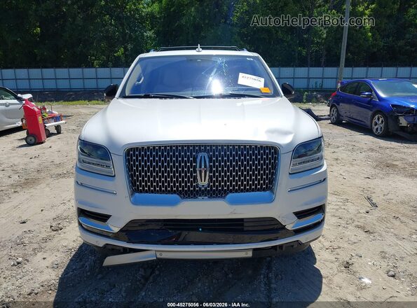 5LMJJ2LT6KEL13314 2019 LINCOLN NAVIGATOR White Widok wnętrza z tyłu
