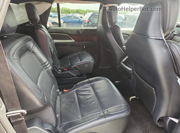 5LMJJ3LG1PEL12779 2023 LINCOLN NAVIGATOR Black Vista interior trasera