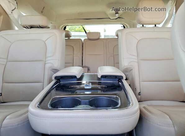 5LMJJ3LTXLEL11654 2020 LINCOLN NAVIGATOR Gold Vista de los asientos traseros