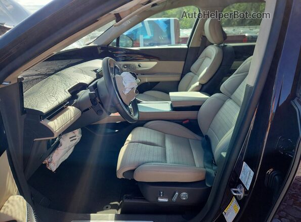 5LMPJ8K46SJ950069 2025 LINCOLN NAUTILUS Maroon Vista interior delantera