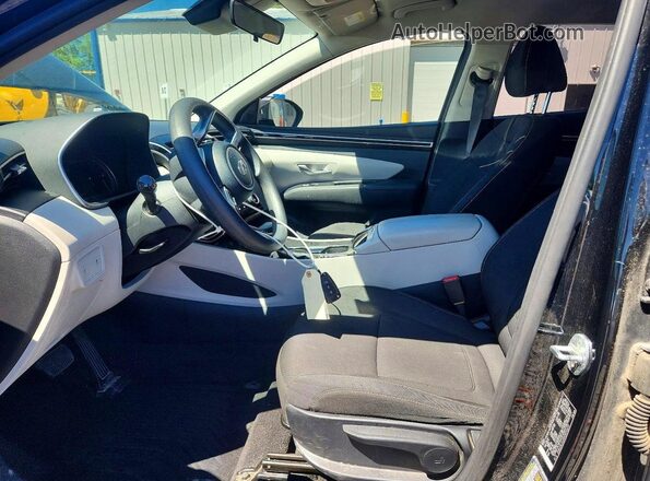 5NMJA3AE8NH093659 2022 HYUNDAI TUCSON Black Front interior view