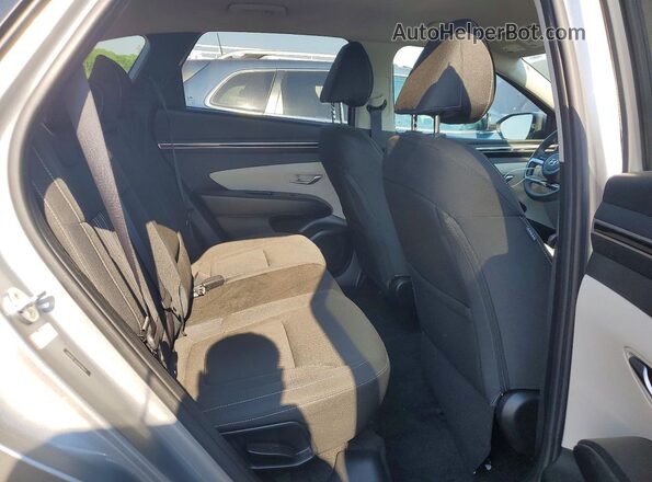 5NMJBCAE4PH218432 2023 HYUNDAI TUCSON Silver Вид задньої частини салону