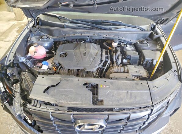 5NMJF3AEXNH096595 2022 HYUNDAI TUCSON Charcoal Vista del compartimento del motor