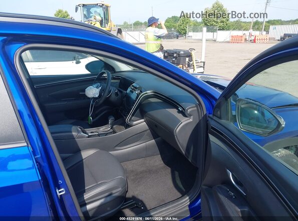 5NMJFCAE0PH286327 2023 HYUNDAI TUCSON Blue Front interior view