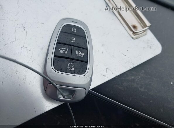 5NMJFCDE5RH360923 2024 HYUNDAI TUCSON Blue Առջևի վահանակի տեսք