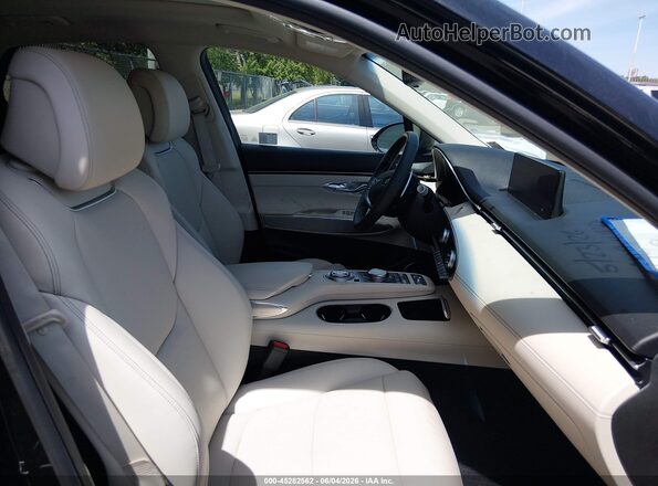5NMMADTB0SH028306 2025 GENESIS GV70 Black Front interior view