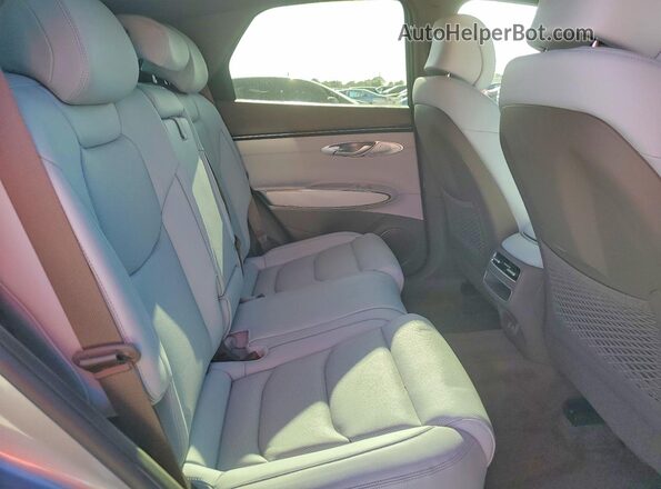5NMMBDTB8TH046762 2026 GENESIS GV70 Silver Vista interior trasera