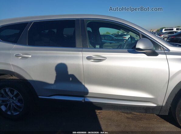 5NMS23AD8KH001096 2019 HYUNDAI SANTA FE Серебряный Вид задней части салона