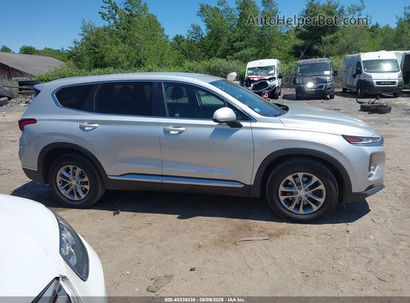 5NMS2CAD3KH102126 2019 HYUNDAI SANTA FE Серебряный Вид задней части салона