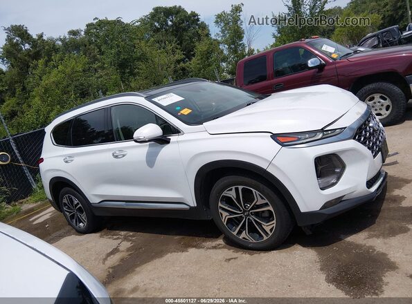 5NMS33AA0LH206559 2020 HYUNDAI SANTA FE White Widok wnętrza z tyłu