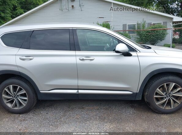 5NMS3CAD2KH074168 2019 HYUNDAI SANTA FE Серебряный Вид задней части салона