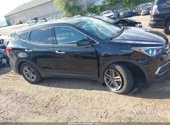 5NMZTDLB2JH092961 2018 HYUNDAI SANTA FE SPORT Черный Вид задней части салона