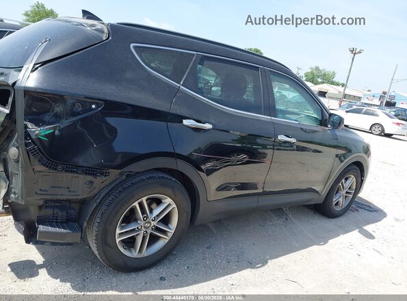5NMZU3LBXHH041564 2017 HYUNDAI SANTA FE SPORT Черный Вид задней части салона