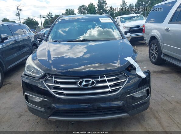 5NMZUDLB0HH022043 2017 HYUNDAI SANTA FE SPORT Black Rear interior view